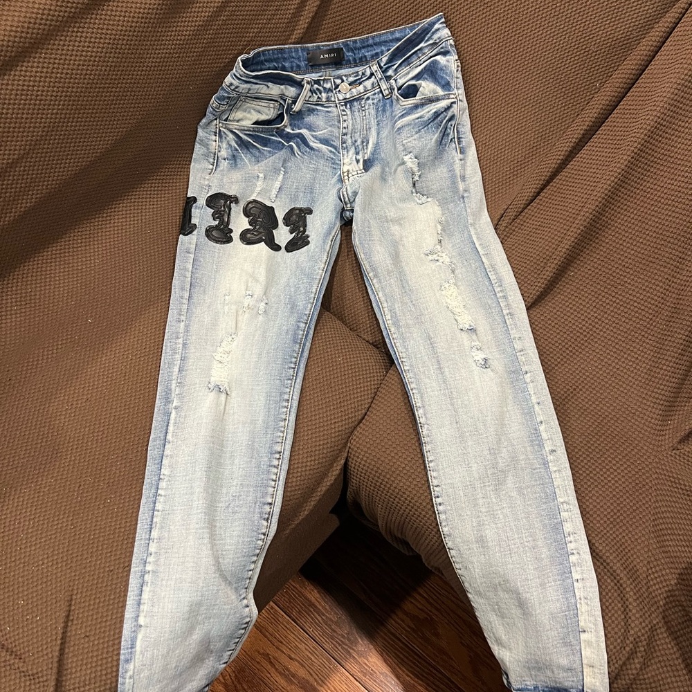 AMIRI Light Blue Jeans with Black Patch